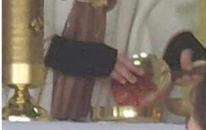 Amazing Photo: Eucharistic Miracle Occurs In The Hands of a Mystic Priest!