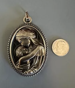 Support Father Calloway’s ministry! Mother and Child Medal