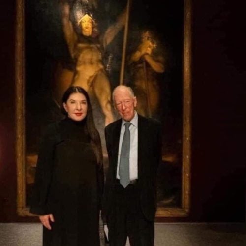 Marina Abramovic And Jacob Rothschild Posing In Front Of “Satan Summoning His Legions” Painting