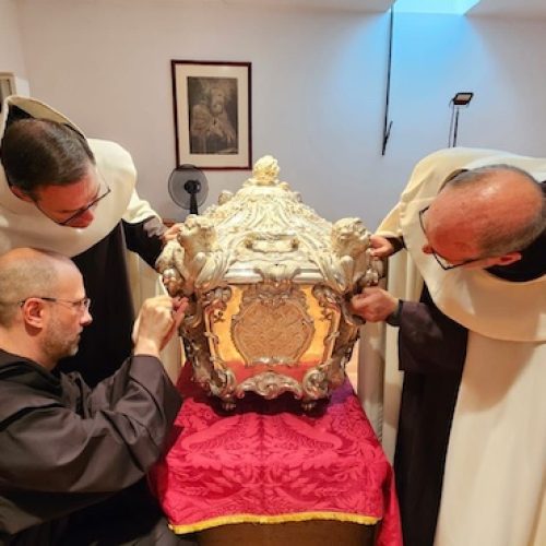 The silver coffin containing the body of St. Teresa of Avila in Alba de Tormes, Spain, is opened for the first time since 1914 and marked the beginning of a study of her relics, which will be carried out by Italian doctors and scientists with Vatican approval. (OSV News photo/courtesy Order of Carmel) Editors: best quality available.