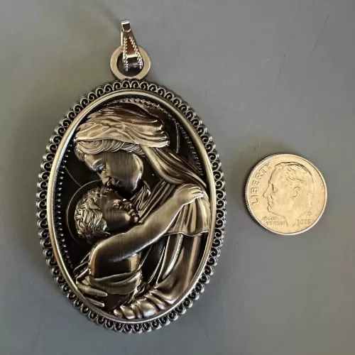 Support Father Calloway’s ministry! Mother and Child Medal